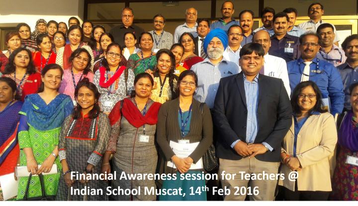 A large group of teachers with Rohit Shah. The caption reads ‘Financial Awareness session for Teachers @ Indian School Muscat, 14th Feb 2016’.