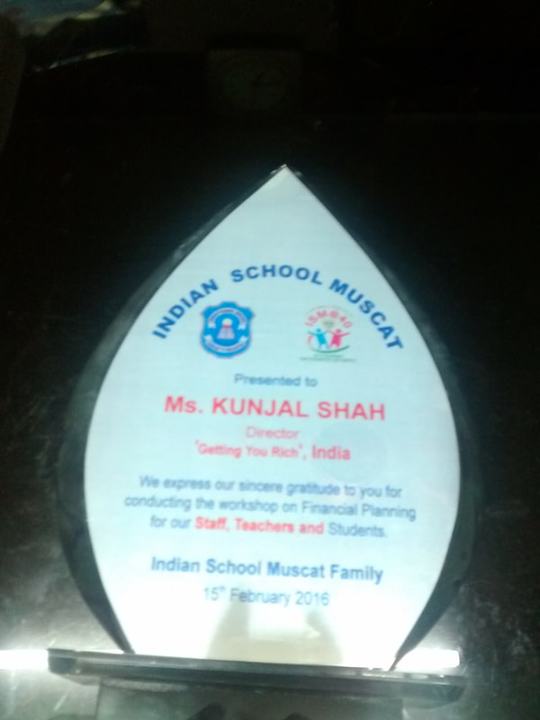 A glass memento from Indian School Muscat presented to Ms. Kunjal Shah, 15 February 2016.