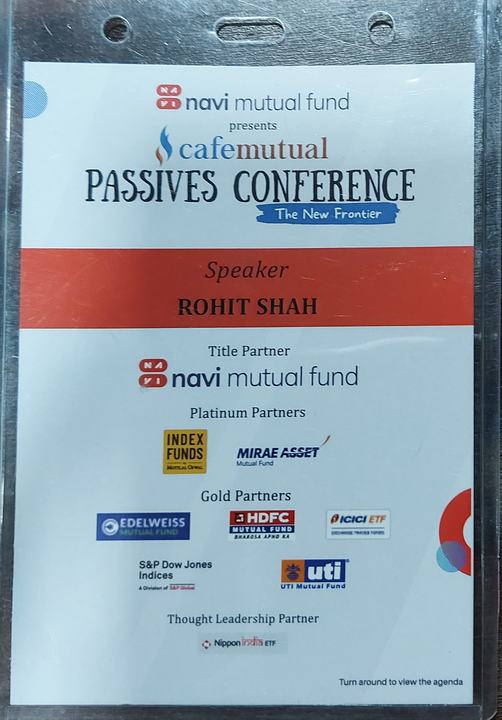 A conference badge reading ‘navi mutual fund presents cafemutual Passives Conference, Speaker, Rohit Shah’.