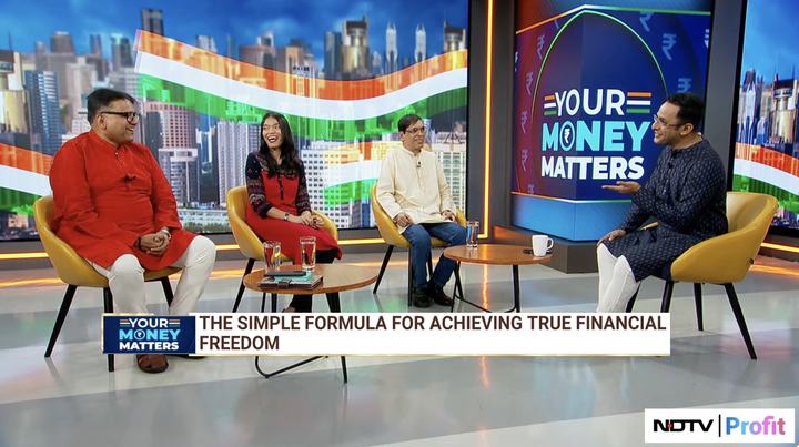 Rohit Shah with two other guests in the NDTV Profit studio. The caption reads ‘The simple formula for achieving true financial freedom’.
